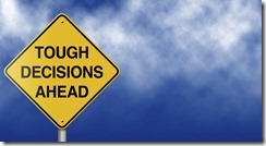 Tough Decisions Ahead Road Sign
